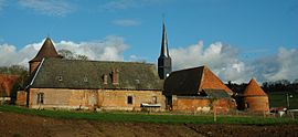 The chateau and church bell tower in Bouelles