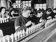 Female foreign workers from Stadelheim prison work in a factory owned by the AGFA camera company, May 1943. The photo was entered into evidence at the IG Farben trial.