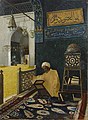 Man reading the Quran (1910)