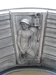 Depiction of a miner with a canary in a cage