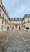 The cour d'honneur and the corps de logis of the Hôtel de Besenval, main entrance