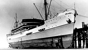 Koolama docked at low tide at Broome, c. 1940