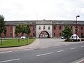 Les pompiers de Menin sont logés dans un ancien hôpital militaire, qu'ils partagent avec la Croix-Rouge, la protection civile et le CPAS.