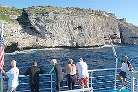 Monito's cliffs from a dive boat.