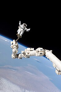 Steven Robinson during extravehicular activity, by NASA