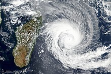 Satellite image of Madagascar with a large cyclone to the right of it in the ocean.
