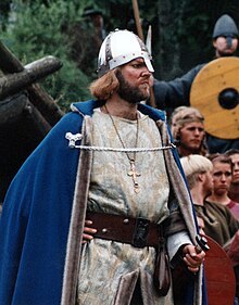 Ingar Helge Gimle wearing a medieval Christian knight's outfit, facing right of camera