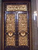 Bronze doors, designed by Cockerell, 12 feet (4 m) 8 inches (20 cm) high by 6 feet (2 m) 4 inches (10 cm) wide and weighs 74 cwt, there are three on each side of the hall, also three similar doors at the south end lead to the Crown Court and a smaller one is beneath the organ.