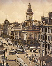 Old cityscape with public building.