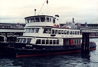 Sirius (1984), the first of nine "First Fleet-class" ferries in her original blue and white livery