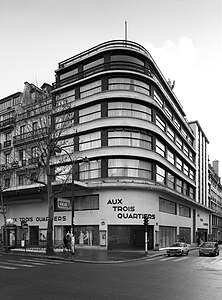 Expressionist architecture influences – Aux Trois-Quartiers department store in Paris, by Louis Faure-Dujarric (1932)[73]