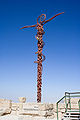 The full view of the Brazen Serpent sculpture atop Mount Nebo
