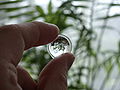 Picture of a biconvex lens whose image is upside-down and smaller than the original