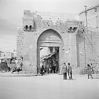 Thomas' gate in 1950, before the authorities tore down the shops, visible in the photo, to make way for a newly paved road.