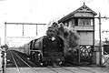 H 220 leads the northbound Albury Express past the signal box at Essendon, c. 1949