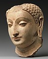 Head of Buddha, from Hadda, Afghanistan, c. 5th–6th century. Metropolitan Museum of Art.[424]