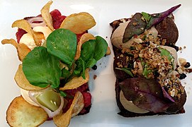 Smørrebrød with green and red salad, chicken liver and tartar sauce