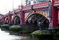 Image 47Vauxhall Bridge across the River Thames opened in 1906 and features sculptures by F. W. Pomeroy.