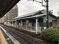 Rear of station building, with level crossing leading to Platform 1.