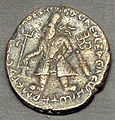 Vima Kadphises in full dress on his coinage in the Greek language, 1st century CE