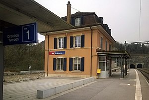 Three-story building with hip roof