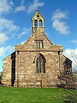 All Saints Church, Boltongate, England, with defensive parapet
