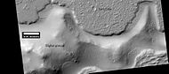 Lava flow. Lava flow stopped when it encountered the higher ground of a mound. Picture was taken with HiRISE under HiWish program.