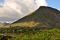 View of Koko Crater from the Kalanianaole Hwy, stairs visible ascending the slope.