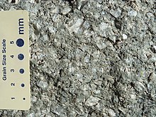 Coarse gray rock surface in close-up