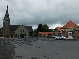 The town hall and church of Pronville