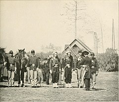 The officer in charge is inspecting the arms of the Zouaves, who are about to dispatch on a provost-guard duty.