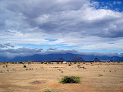 The Agasthiyamalai range, constituting the southern end of the Western Ghats, as seen from the rainshadow region of the southwest monsoon in Tirunelveli, Tamil Nadu.