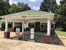 The reconstructed Ben Roy Service Station that stood next to the grocery store where Till encountered Bryant in Money, Mississippi,[242] 2019