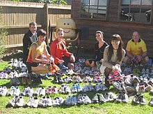 Gorgi Coghlan (second from right) with members of Flying Start Australia's Shoes for Planet Earth program
