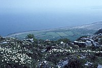 View from the saddle in Gleninagh South looking over Galway Bay, with Gleninagh Castle near the coast to the left