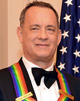 Tom Hanks posing for a photo after a dinner hosted by U.S. Secretary of State John Kerry at the U.S. Department of State in Washington, D.C., on December 6, 2014.