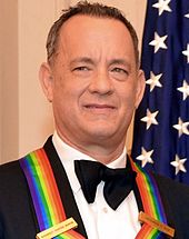 Tom Hanks posing for a photo after a dinner hosted by U.S. Secretary of State John Kerry at the U.S. Department of State in Washington, D.C., on December 6, 2014.