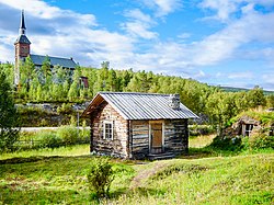 Utsjoki Church and a log cabin
