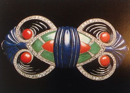 Gold buckle set with diamonds and carved onyx, lapis lazuli, jade, and coral, by Boucheron (1925)