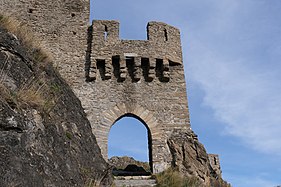 Opening in the centre of a stone wall.