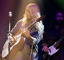 James playing guitar