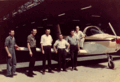 Victa factory staff in front of what's believed to be the first Airtourer exported to the USA