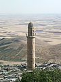 Minaret of the Grand Mosque of Mardin (12th century) and the view of the Mesopotamian plains.