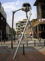 Image 67Statue of a tripod from The War of the Worlds in Woking, England, the hometown of author H. G. Wells. The book is a seminal depiction of a conflict between mankind and an extraterrestrial race. (from Culture of the United Kingdom)