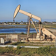 pumpjack with san gabriel mountains in background