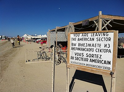 A Burning man version of the sign at Checkpoint Charlie