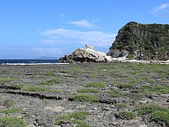 Kapurpurawan Rock Formation rocky ground distant