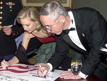 Katie Harman, Miss Oregon 2001 and Miss America 2002, signing poster