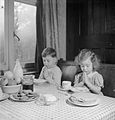 Luxembourgish children (evacuees) in Surrey, England (1942), saying grace before a meal