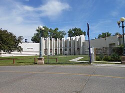 An Art Deco fairgrounds building painted white